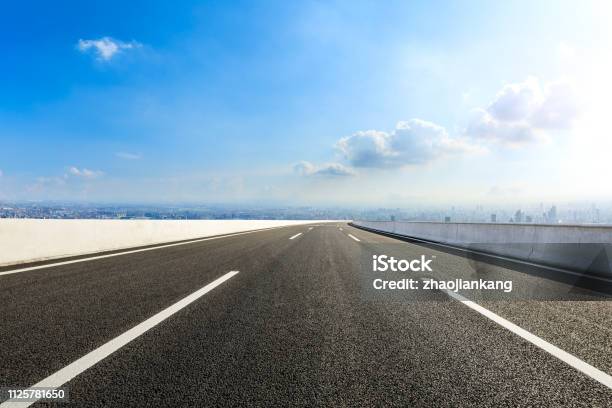 Empty Asphalt Road And Modern City Skyline With Buildings In Shanghai Stock Photo - Download Image Now