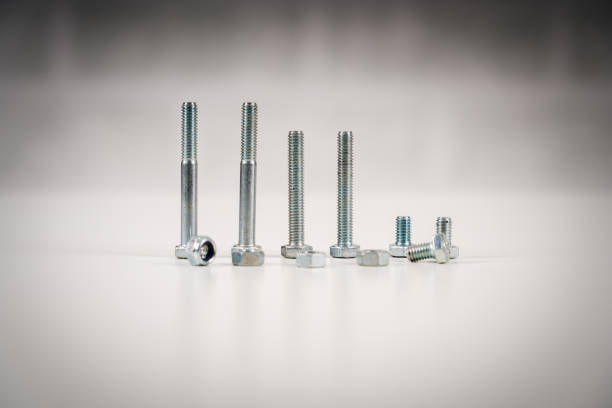 istock Metal screw, bolt and nuts on white background 1125783815
