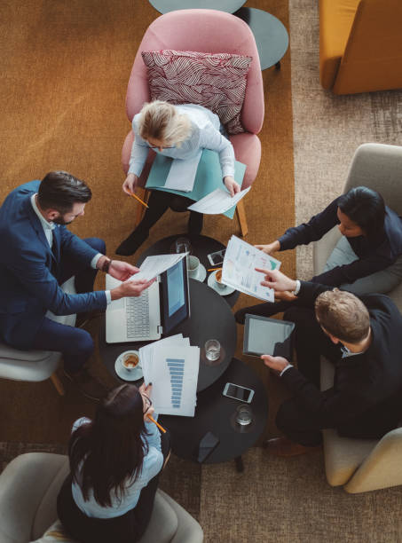 istock Group of business people in office cafeteria 1125784587