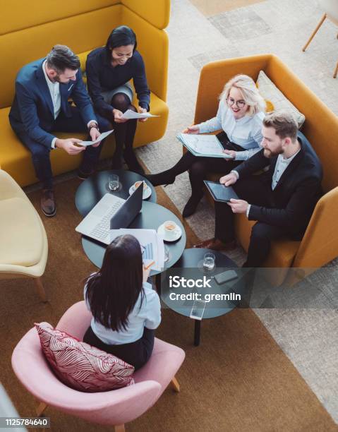 Group Of Business People In Office Cafeteria Stock Photo - Download Image Now - Business, Meeting, Teamwork