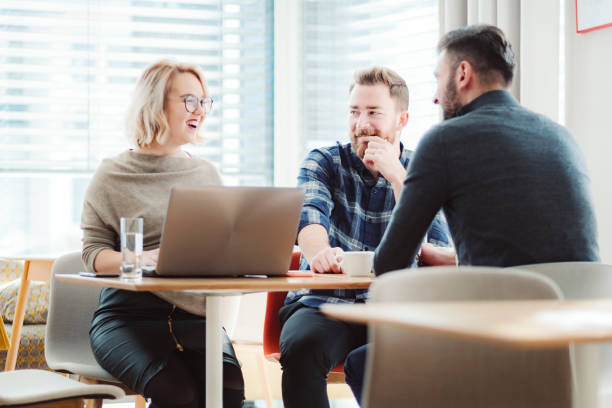 istock Group of people in office cafeteria 1125784810