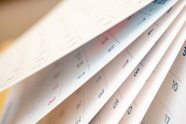 istock Abstract blur calendar page flipping sheet close up background 1125785932