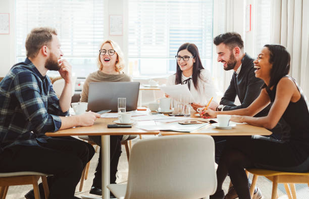 istock Group of people in office cafeteria 1125785990
