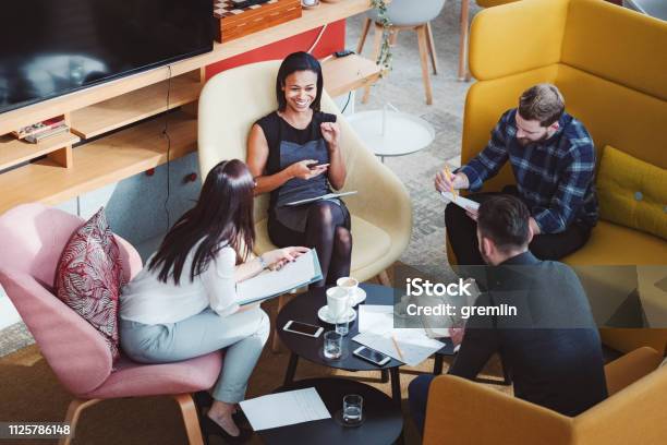 Group Of Business People In Office Cafeteria Stock Photo - Download Image Now - Coffee - Drink, Relaxation, Meeting