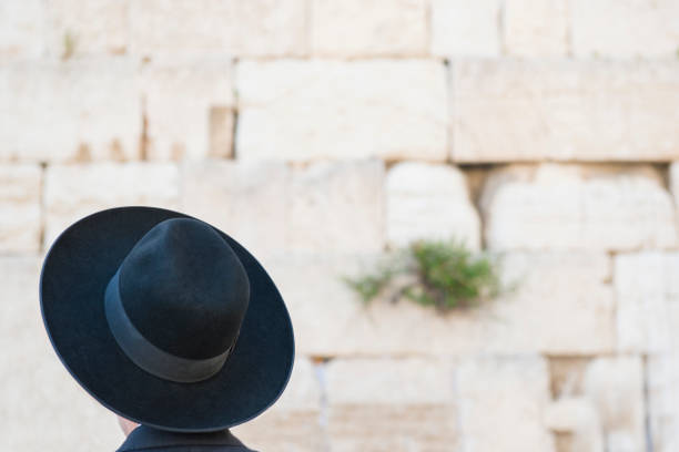istock Faith on the Wailing Wall of Jerusalem 1125788593