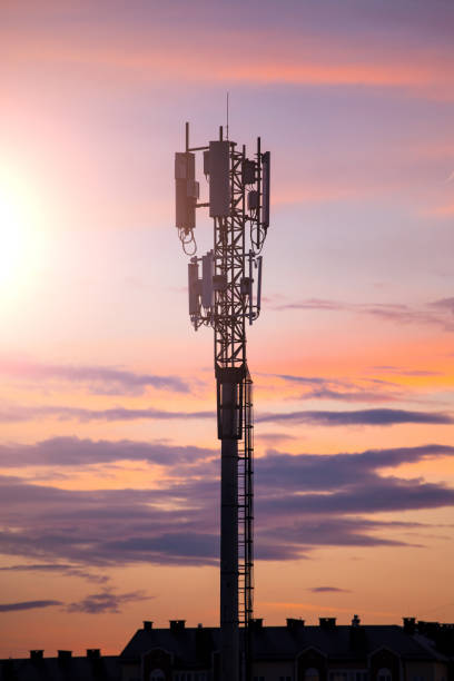 istock silhouette of telecommunications tower on sky background 1125790908