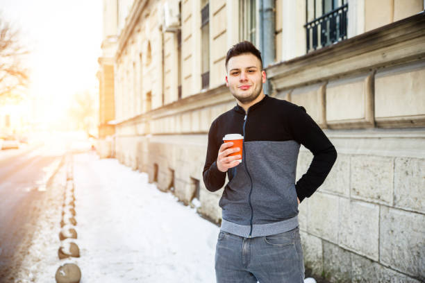 istock Walking with cup of coffee 1125797567