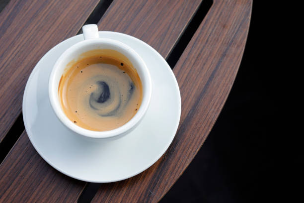 istock Hot coffee on wood background. 1125798934