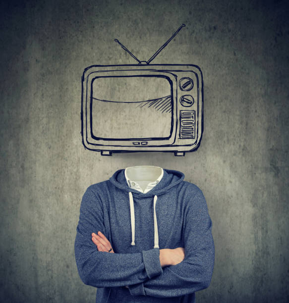 istock addicted man with television instead of his head on gray background 1125799786