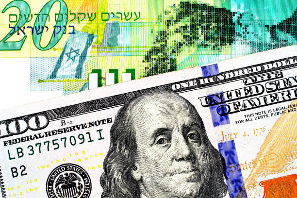 istock A twenty New Israeli Shekel note with an American one hundred dollar bill 1125799798