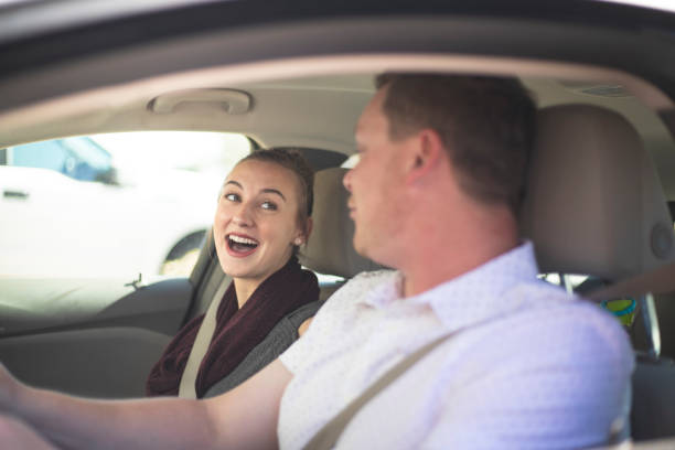 istock Young Couple in a Car 1125801347