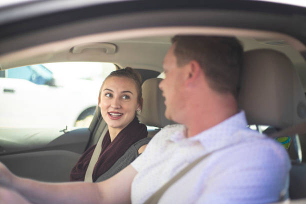 istock Young Couple in a Car 1125801354