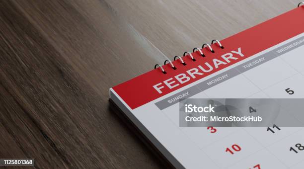 Red February 2019 Calendar On Brown Wood Surface Stock Photo - Download Image Now - 2019, Annual Event, Brown