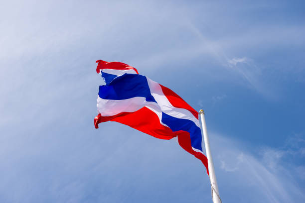 istock Thai flag waving with cloud and blue sky in background with copy space 1125801387