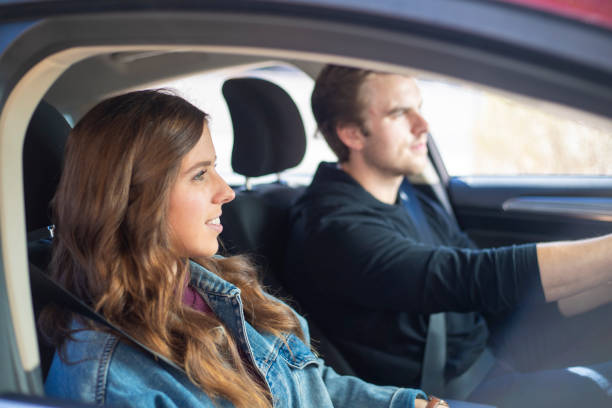 istock Young Couple in a Car 1125801430