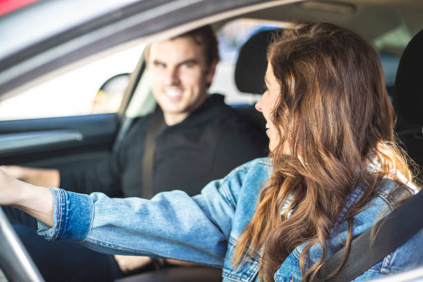 istock Young Couple in a Car 1125801469