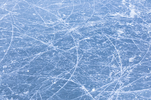 Skate marks can be seen on the surface of this frozen lake in Canada.