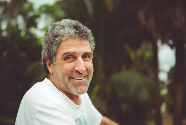 istock Handsome guy in his 50’s outdoors in an all terrain vehicle 1125812796