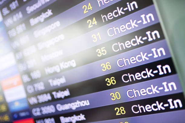 istock Flight check in status at digital display in airport 1125816805