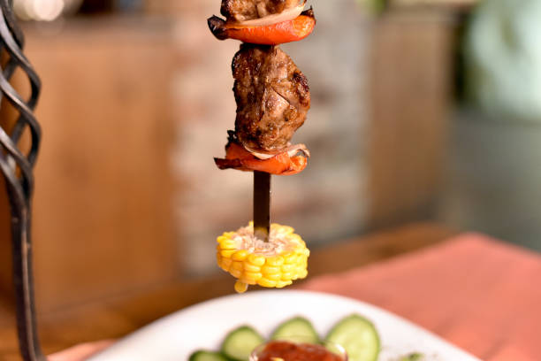Pork on skewers cooked on the grill. Barbecue