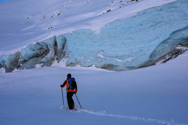 istock Backcountry skier passing an ancient glacier 1125823264