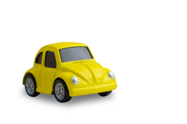 istock small yellow metal car isolated on white background 1125823328
