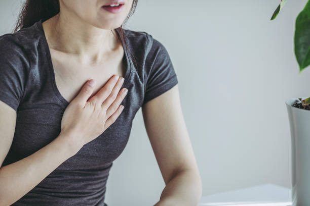 istock A woman with chest pain 1125824164