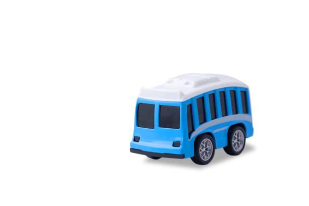 istock small blue metal toy bus isolated on white background 1125825247