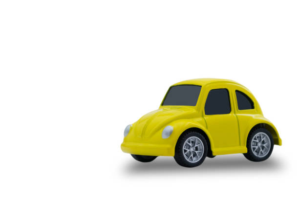 istock small yellow metal car isolated on white background 1125825253