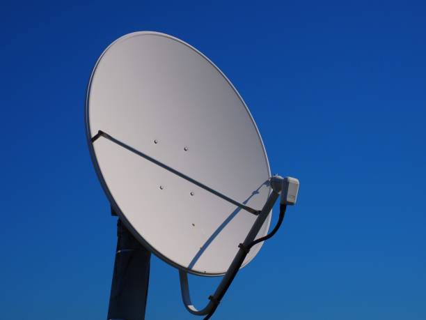 istock satellite dish antenna isolated on clear sky 1125825361