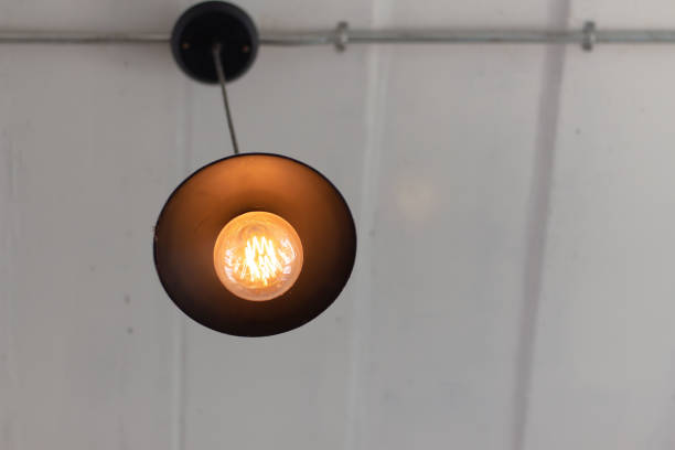 istock Incandescent lamps in a modern cafe. 1125826225