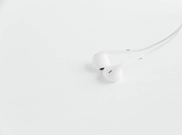 istock white headphones on the white background 1125826463