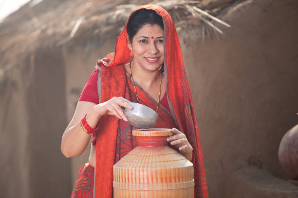 Rural woman drinking water