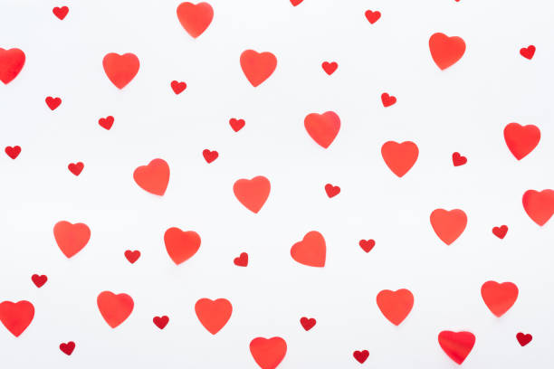 istock background of multiple paper hearts isolated on white, st valentines day concept 1125831132
