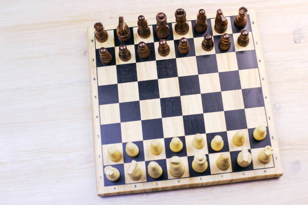 istock Chess board with wooden chess pieces on the table 1125832225
