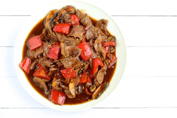 istock Beef black pepper with mushroom and red bell pepper 1125833600