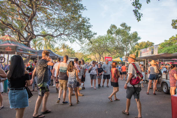 Food Vendors and Market Crowd Darwin, Northern Territory, Australia-October 8,2017: Mindil Beach markets bustling with crowds and market stalls in Darwin, Australia darwin nt stock pictures, royalty-free photos & images