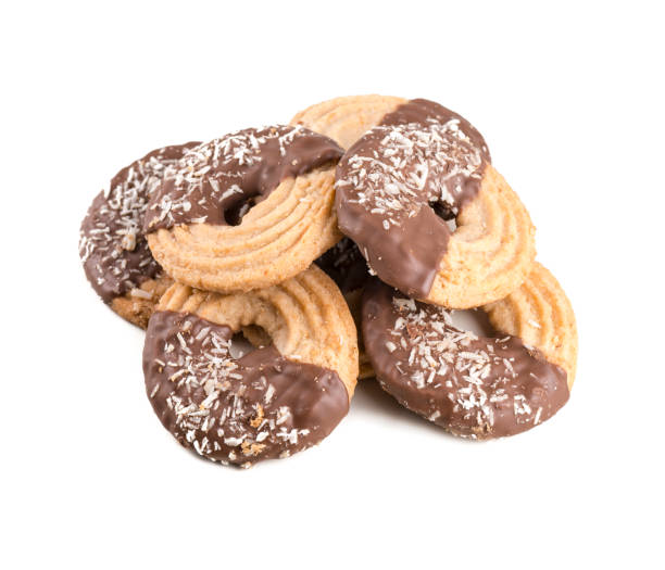 istock Chocolate cookie sprinkled with coconut isolated on white 1125834514