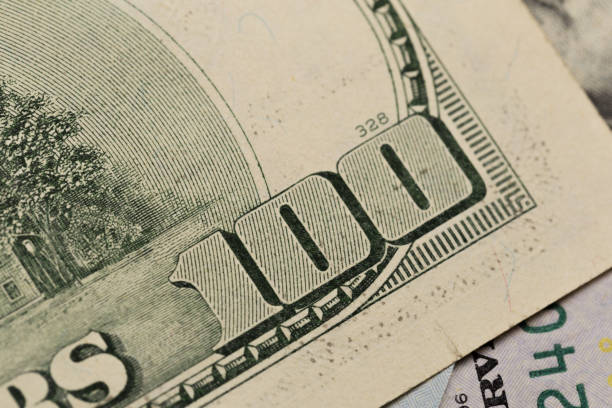 istock US hundred  Dollar elements , super macro, close up photo 1125836056