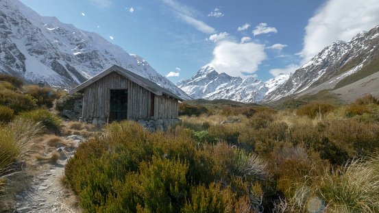 wide angle shot of stocking stream shelter and mount cook in new zealand