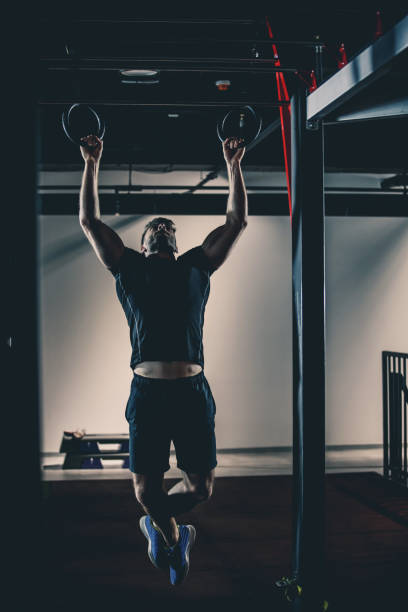istock Muscular man is doing bodyweight training in the gym 1125838054