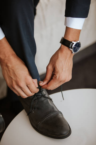 istock Businessman tying up shoes 1125838256