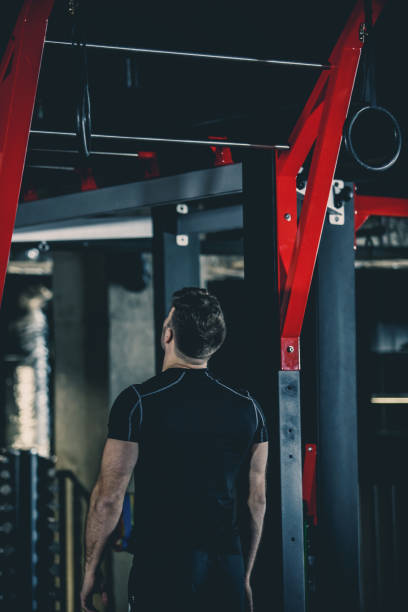 istock Man doing bodyweight training in the gym 1125838865