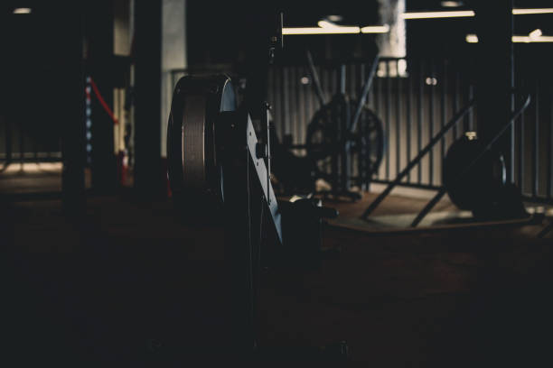 Exercise machines in a dark gym