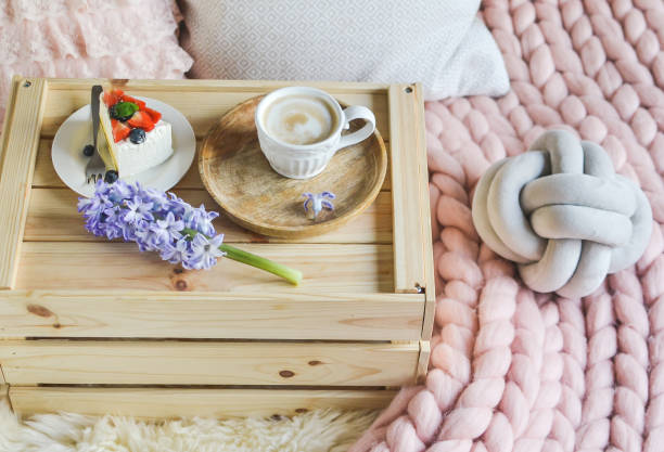 istock Breakfast in Bed with Cake and Cappuccino 1125839545