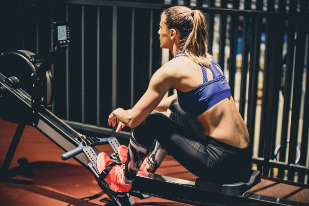 istock Woman resting between workouts at the gym 1125843279