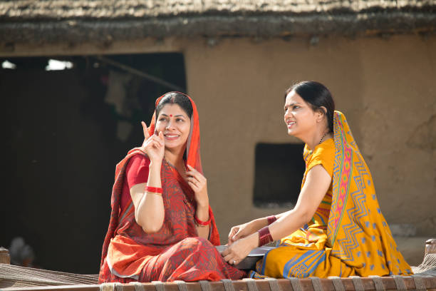 istock Rural women discussing on bed 1125843626