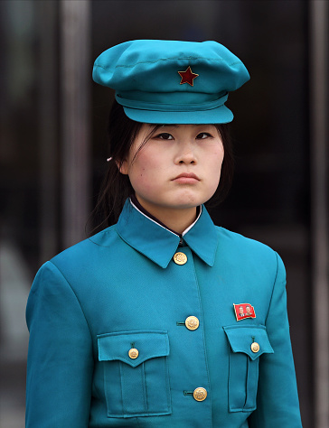 April 14, 2018. Pyongyang, North Korea.\nIn North Korea, some state officials are wearing a special uniform. In North Korea, all state officials are voluntarily wearing the pins of the founder leader Kim Il-Sung and his son's portraits.