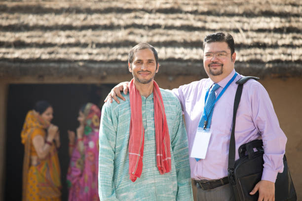 istock Real estate agent with client at village 1125844378
