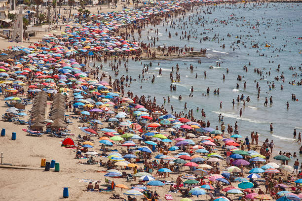 istock Mediterranean coastline in Spain. Calpe beach. Summer crowd. Alicante 1125848802